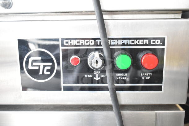 Chicago Commercial Floor Vertical Compactor, model Trashpacker, control panel with buttons and company branding.