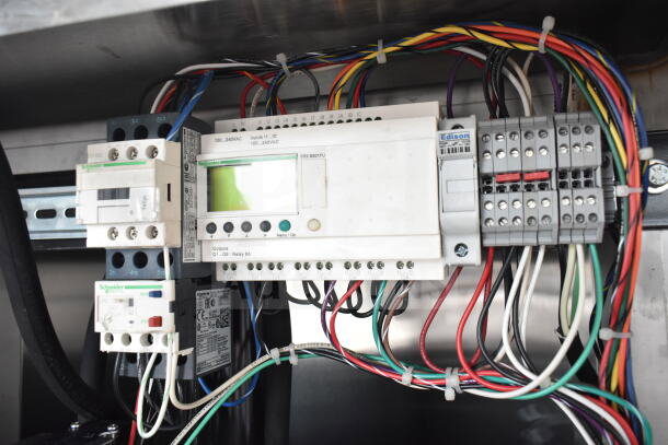 Chicago Commercial Trash Compactor control panel with wiring; Schneider and Edison components visible.