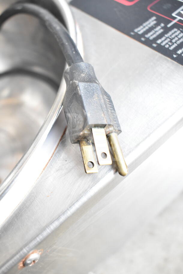 ChocoVision Commercial Chocolate Temperer power cord, 115 Volts, well-maintained metal casing, countertop model.
