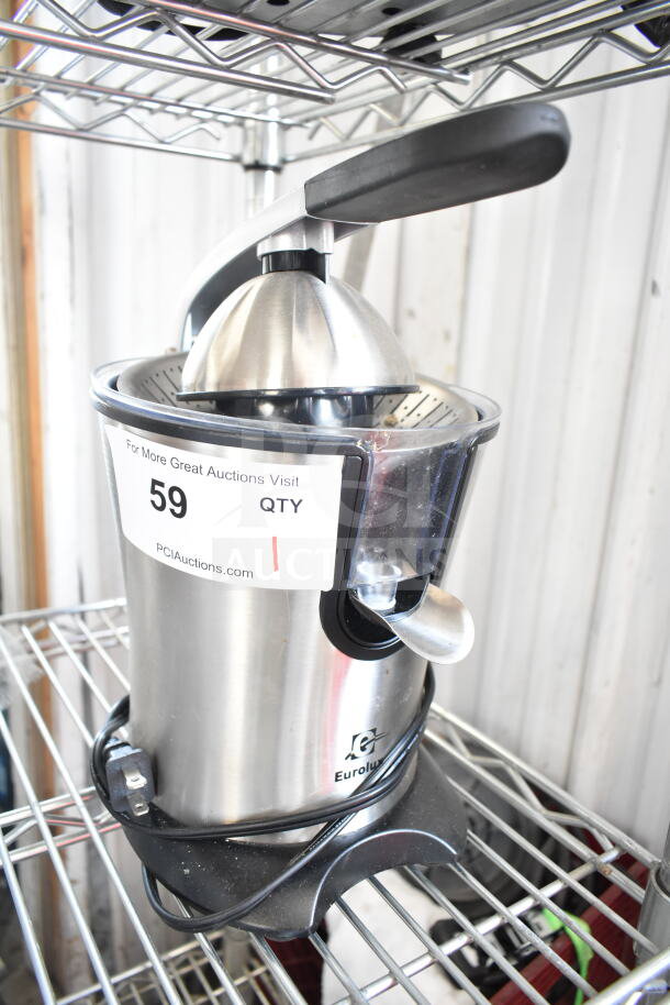 Eurolux ELCJ-1600S stainless steel citrus juicer, 120V, 1 phase, countertop model, with power cord visible; auction label "59" attached.