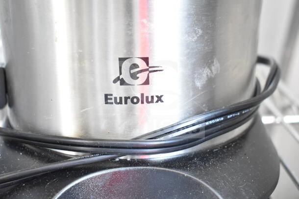 Eurolux ELCJ-1600S countertop citrus juicer, stainless steel, logo visible, some wear marks, 120V, 1 Phase.
