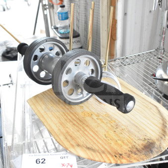 Seven-item lot featuring a wooden pizza paddle, steel rolling unit with handles, and cord. Auction label reads "62 QTY X-7v."