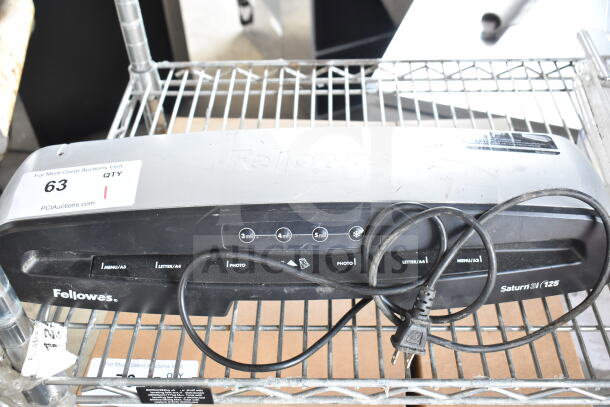 Fellowes Saturn 3i 125 Pouch Laminator, black and silver, with power cord, visible control buttons, fair condition.