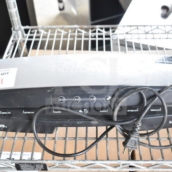 Fellowes Saturn 3i 125 Pouch Laminator, black and silver, with power cord, visible control buttons, fair condition.