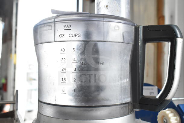 Cuisinart FP-8 food processor with clear measurement markings, black handle, in good condition. 120 volts, 1 phase.