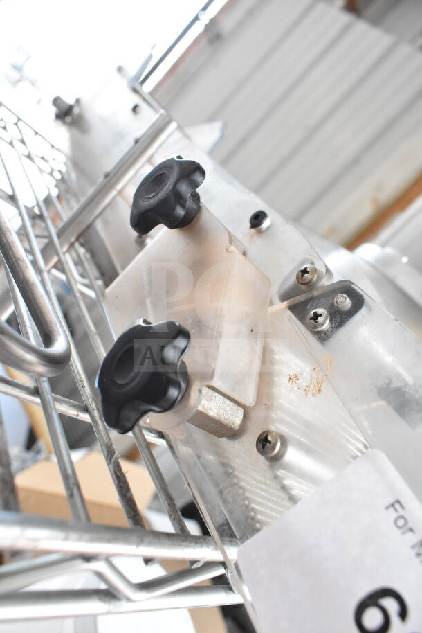 Chocovision Enrober 10, compatible with Revolation Delta Chocolate Temperer. Visible knobs and metal framework.