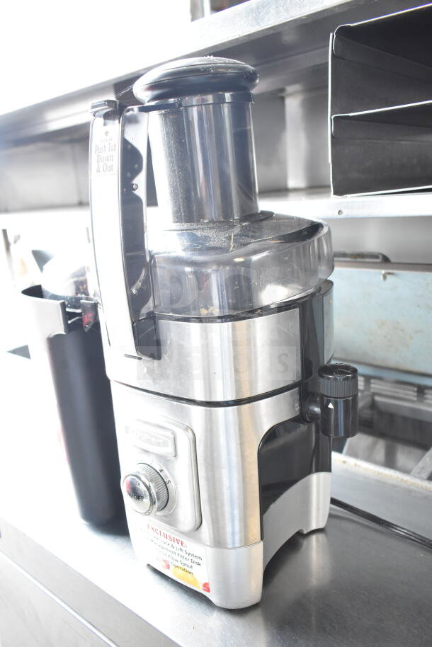 Cuisinart CJE-1000 countertop juicer, 120 volts, 1 phase, stainless steel finish, clean condition, easy-pour spout.