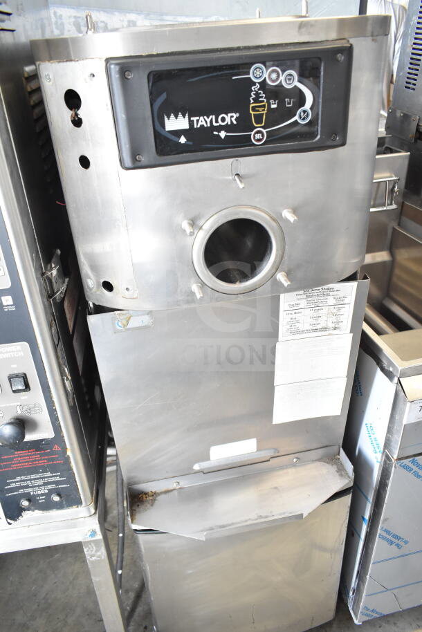 Taylor C709-33 commercial air-cooled soft serve machine with control panel, single flavor, on casters, 208-230V, 3 phase.