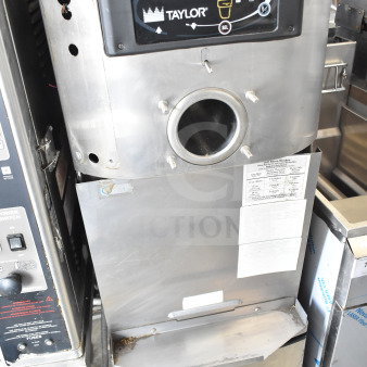 Taylor C709-33 commercial air-cooled soft serve machine with control panel, single flavor, on casters, 208-230V, 3 phase.