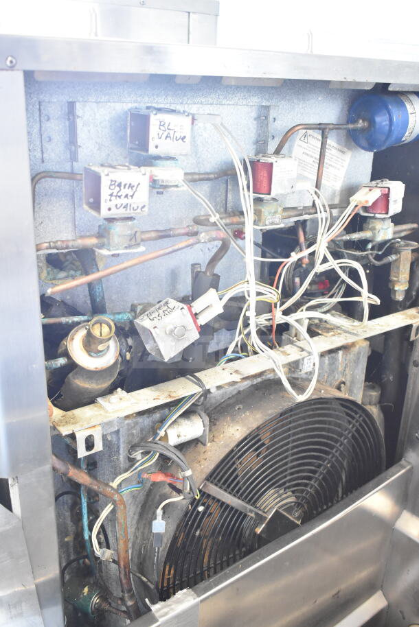 Taylor C709-33 commercial air-cooled single flavor soft serve ice cream machine, interior view with wiring and components visible.