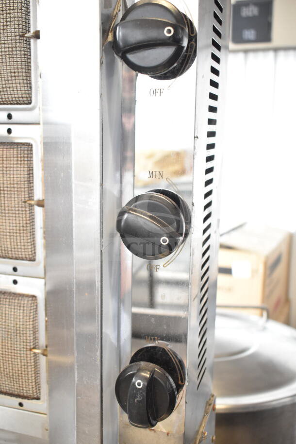 GB-800 Commercial Gyro Machine, propane gas, 110V, 1 phase. Features adjustable control knobs, stainless steel body.