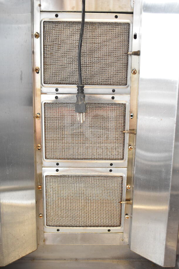GB-800 Commercial Gyro Machine, propane-powered, stainless steel, Model GB-800, 110 volts, 1 phase, good condition.