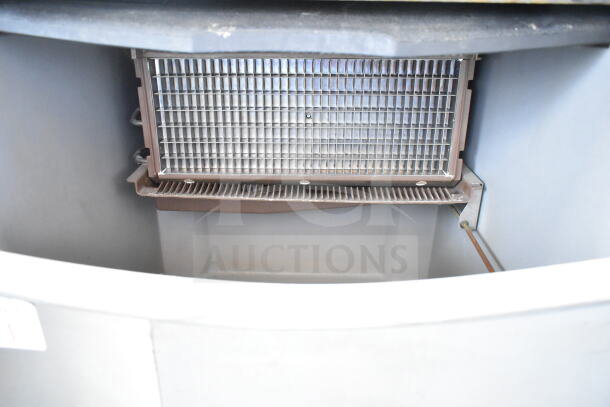 Ice-O-Matic ICEU220HA3 undercounter ice machine interior; visible grid structure. 115V, 1-phase, commercial unit.