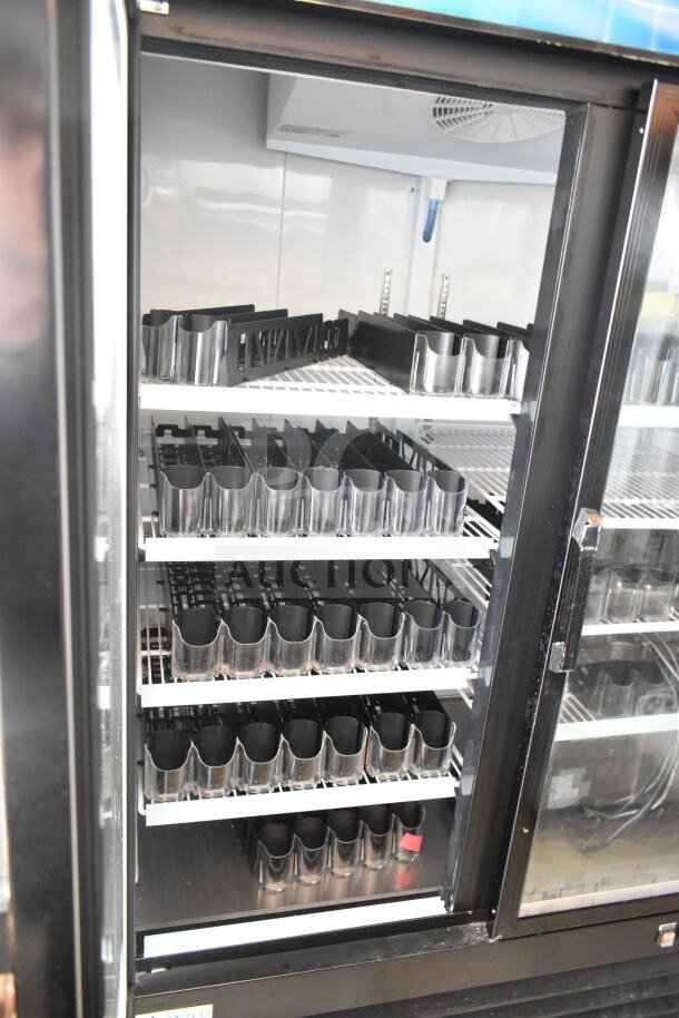 2025 Avantco 178GDC49HCB Commercial 2 Door Cooler; 115 Volts, 1 Phase; shelves with product dividers inside.