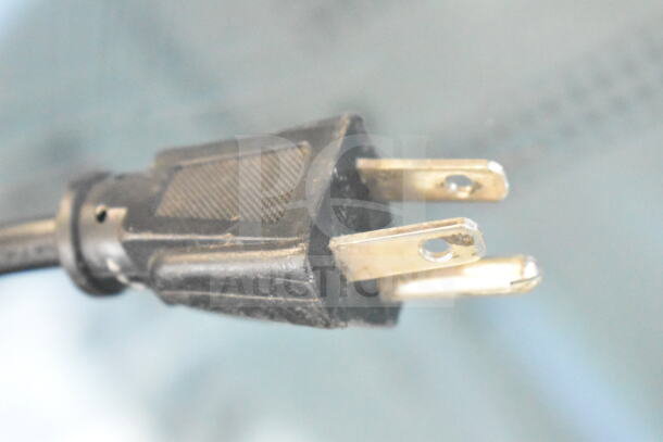 IDW G-11-C33EB commercial reach-in cooler plug. 115 volts, 1 phase. Black plug with visible pins.