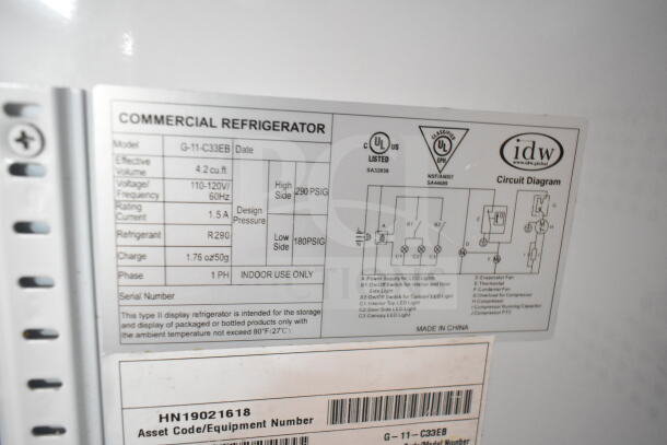 IDW G-11-C33EB commercial cooler tag showing model, 115V specs, refrigerant type R290, and UL certification.