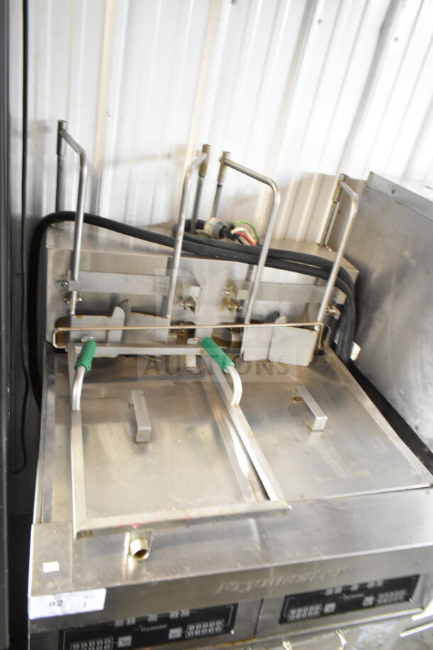 Frymaster FPH214BLSC commercial 2 bay deep fat fryer with Pitco Frialator, electric, 208V, 3 phase, on casters.