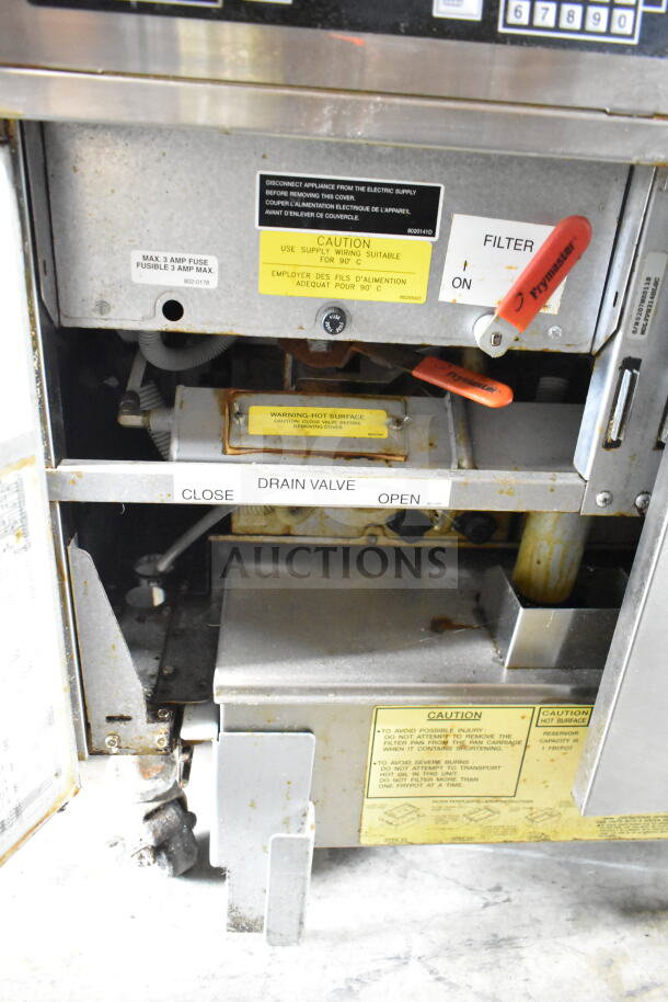 Frymaster FPH214BLSC 2-bay electric fryer on casters, with Pitco Frialator. Includes warning labels and drain valve.