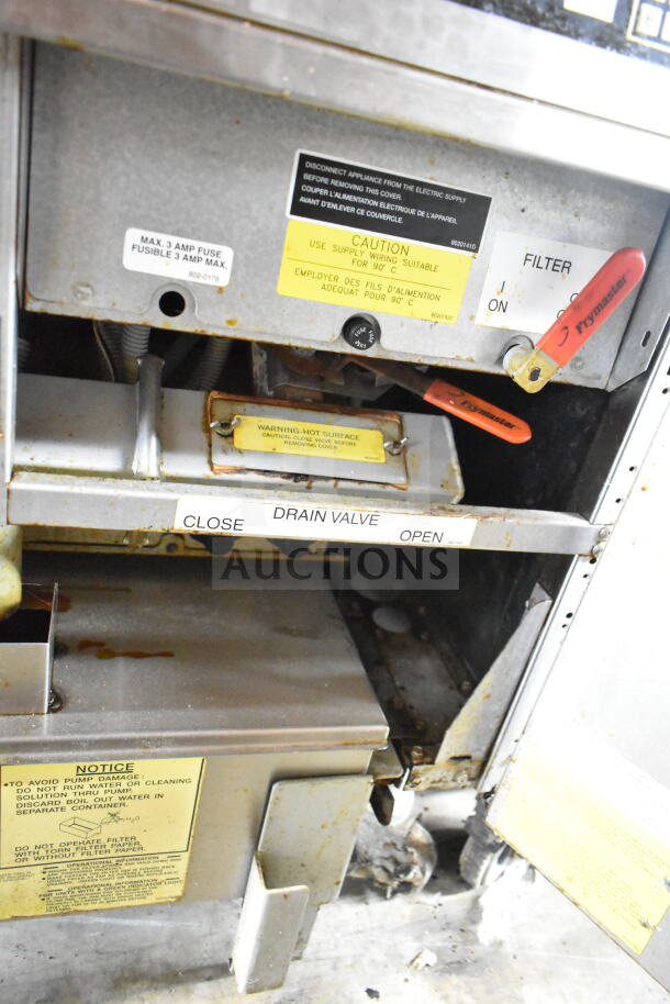 Frymaster FPH214BLSC electric fryer, 2-bay, with Pitco Frialator, commercial casters, visible caution labels, 208V, 3-phase.