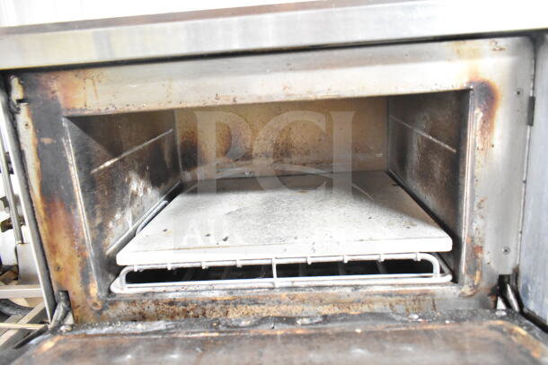 Turbochef NGC commercial electric rapid cook oven, interior view, used condition, showing oven cavity with stone base.