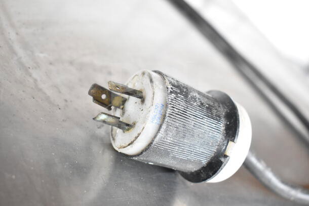 American Panel AP10BCF100-2 Blast Chiller plug, 200V, 1 Phase, marked HBL2321, 20A 250V, shows wear.