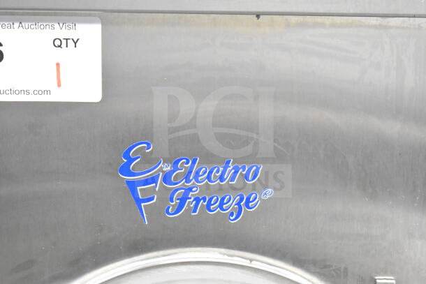 Electro Freeze 876-234 commercial frozen beverage machine, stainless steel, logo visible, on commercial casters, 115V, 1 Phase.