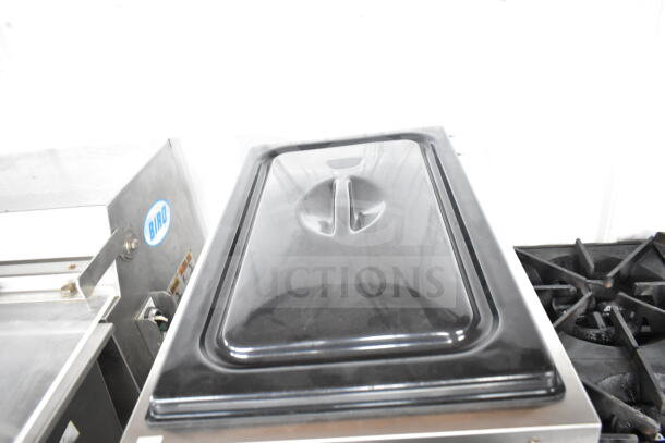 Electro Freeze 876-234 frozen beverage machine on casters, 115V, 1-phase, commercial-grade, with sleek top panel.