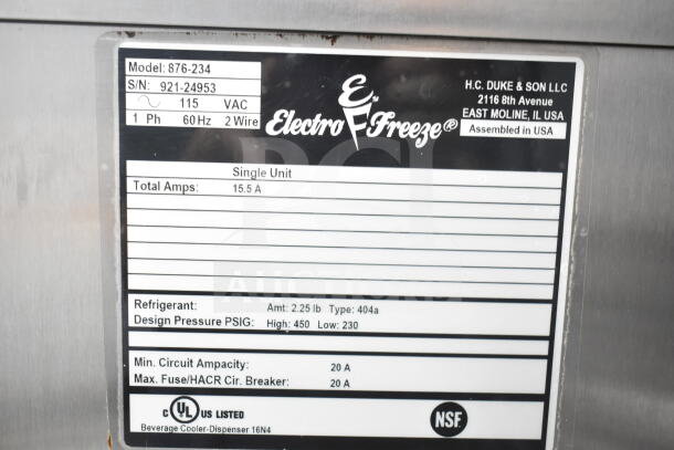 Electro Freeze 876-234 commercial frozen beverage machine on casters; 115 volts, 1 phase. Visible label shows model and specs.