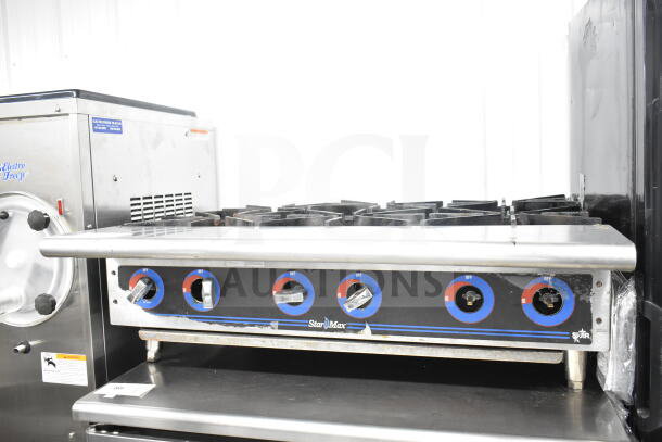 Star Max Commercial Countertop Gas 6 Burner Range, black knobs, stainless steel, used condition, model identification visible.