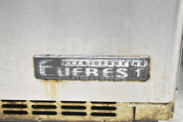 Everest ETBSF2 Commercial 2 Door Undercounter Freezer; 115V, 1 Phase; visible wear, Everest label on door.