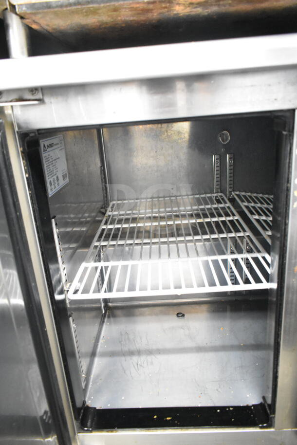 Everest ETBSF2 Commercial 2 Door Undercounter Freezer, stainless steel interior, 115V, 1 Phase, model label visible.