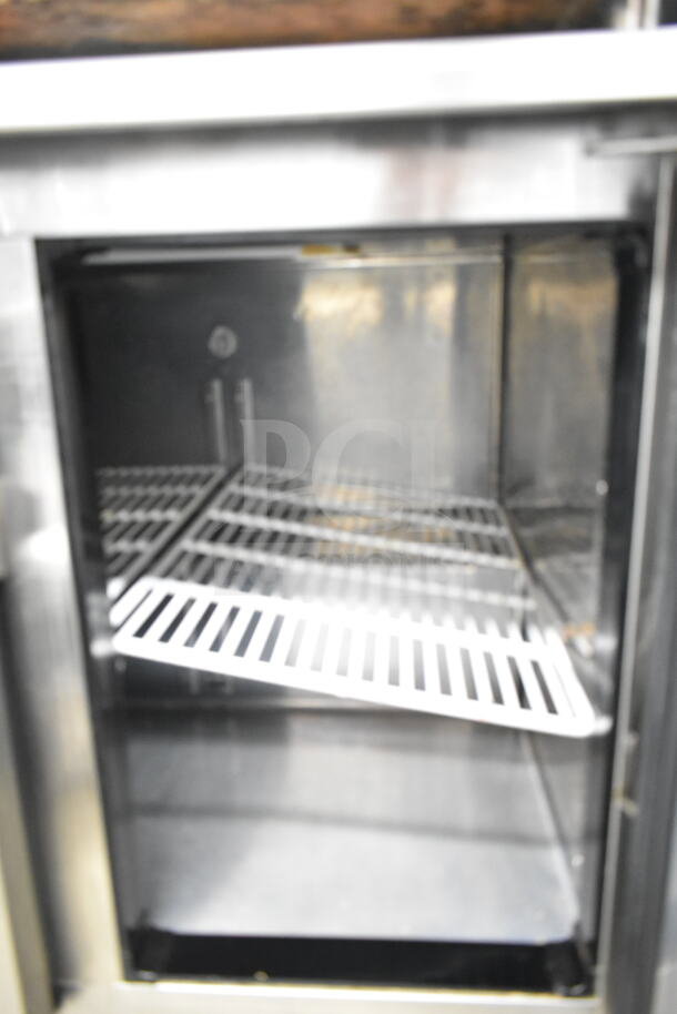 Everest ETBSF2 commercial 2-door undercounter freezer, stainless steel, 115V, 1 phase, features interior wire shelving.