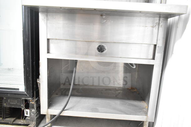 Commercial electric powered steam table with sneeze guard, 120/208 volts, 1 phase, stainless steel, adjustable knob.