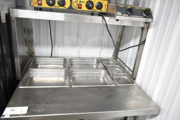 Commercial electric steam table with sneeze guard, 120/208V, 1 phase, multiple compartments, stainless steel, used condition.