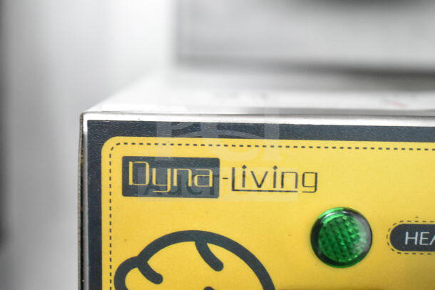 Dyna Living XC-XG-2 Countertop Double Waffle Cone Maker panel with green indicator light; 110 Volts, 1 Phase.