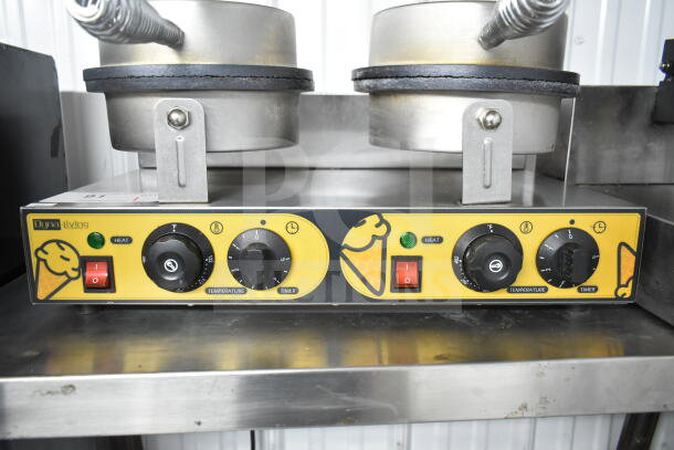 XC-XG-2 Countertop Double Waffle Cone Maker, 110 Volts, 1 Phase, adjustable temperature and timer controls, good condition.