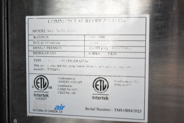 Turbo Air TOM-50M commercial open merchandiser label, 120V, 1 Phase, ETL certified, uses R-404A refrigerant, serial TMM150167023.
