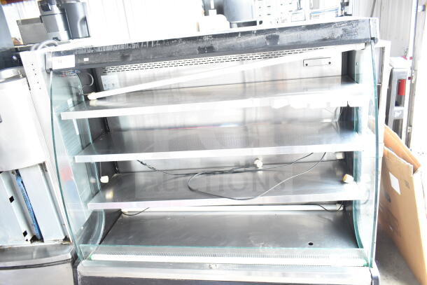 Turbo Air TOM-50M commercial open merchandiser, 120 volts, 1 phase. Features glass shelves, visible wiring, fair condition.