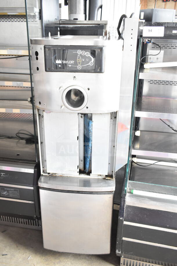Taylor C709-33 commercial air-cooled single flavor soft serve machine on casters, 208-230V, 3 phase.