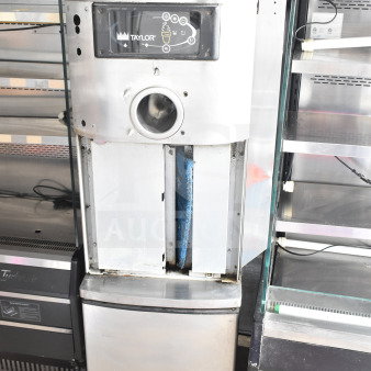 Taylor C709-33 commercial air-cooled single flavor soft serve machine on casters, 208-230V, 3 phase.