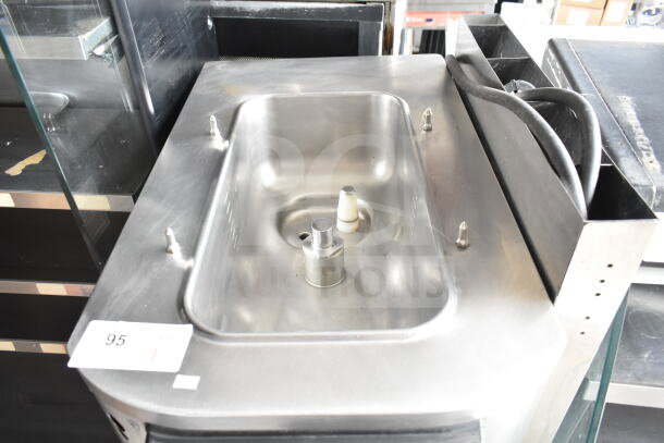 Taylor C709-33 commercial air-cooled soft serve machine, stainless steel, single flavor, on casters, 208-230V, 3 phase.