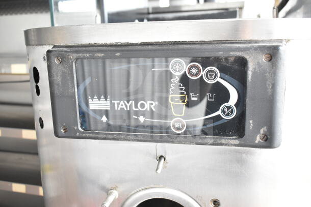 Taylor C709-33 commercial air cooled single flavor soft serve ice cream machine, visible control panel, on commercial casters.