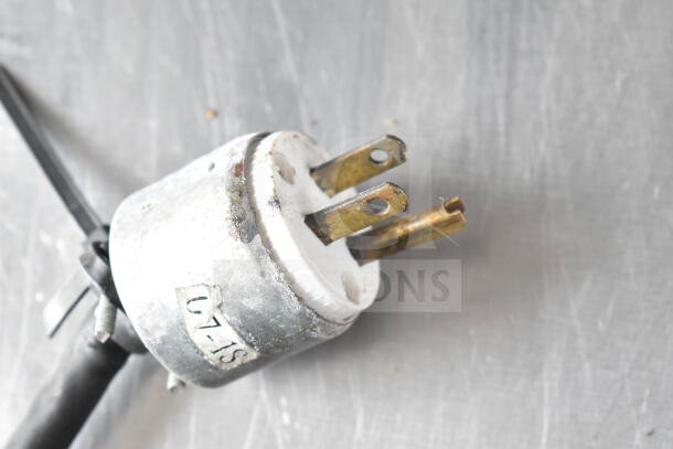 Turbo Air Grab N Go Merchandiser plug, 120 volts, 1 phase, metal casing, visible wear, label reads "07-18."