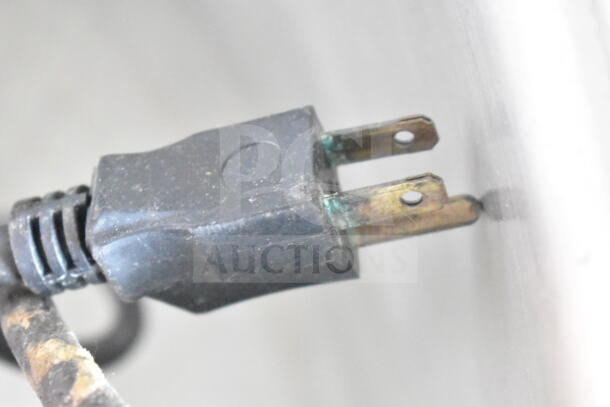 Close-up of a corroded plug showing signs of wear, associated with a Cleveland KGL-40 steam kettle.