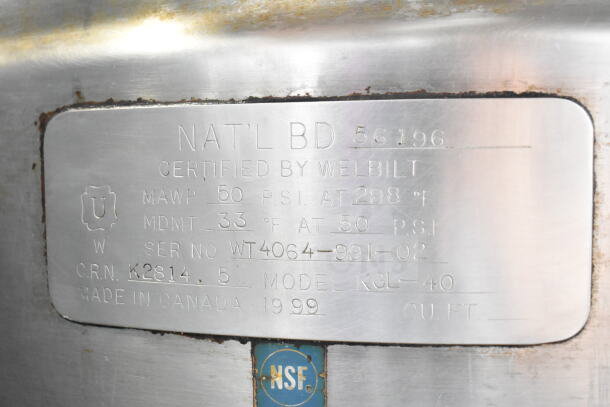 Cleveland KGL-40 Steam Kettle label shows MAWP 50 PSI, MDMT 33°F, Serial WT4064-991-02, NSF certified, made in Canada 1999.