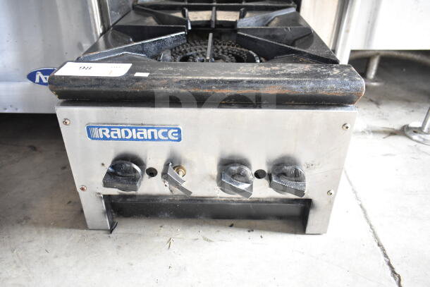 Radiance commercial countertop gas-powered 2-burner range, metal knobs, branded front panel, showing moderate wear.