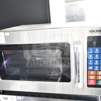 2022 Solwave 180MW112T commercial microwave, stainless steel, 120V, digital keypad, excellent condition, auction label visible.