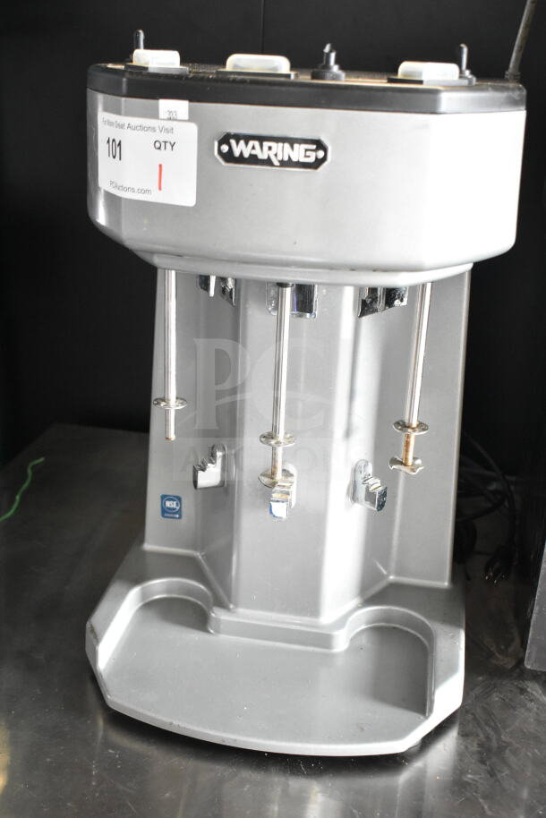 Waring WDM360 commercial 3-head drink mixer, metal finish, 120V, 1 phase, good condition, brand and model visible.