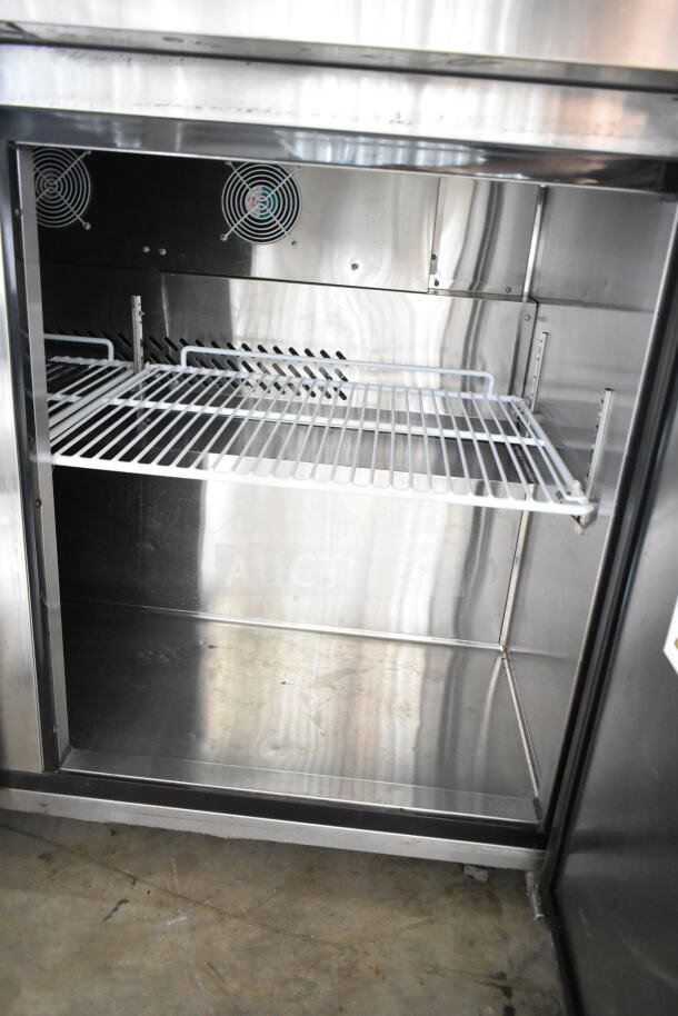 2021 Atosa MGF8406GR commercial undercounter freezer, 2 doors, 115 volts, 1 phase, stainless steel interior, shelf visible.