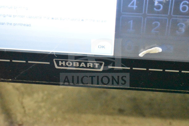 2017 Hobart HTi-7LH26 commercial scale, tested working, clear display, Hobart logo visible, supports 120/208-240V, 1 phase.